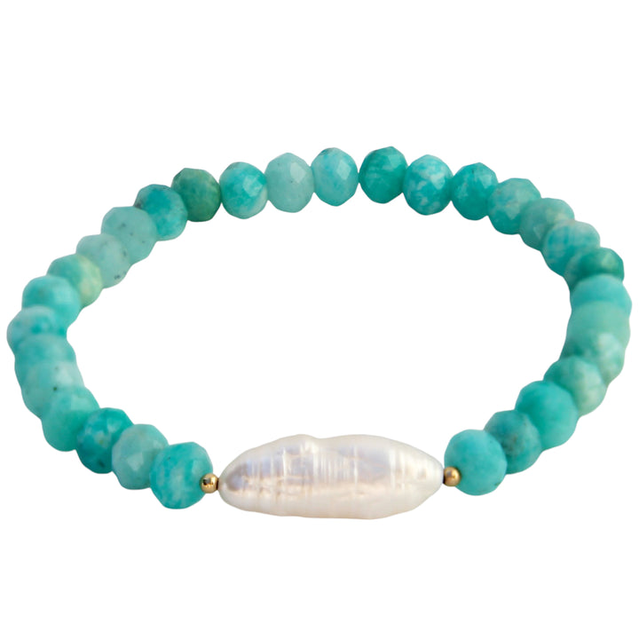 A handcrafted bracelet featuring faceted Amazonite beads in shades of bright  turquoise and a single elongated freshwater pearl, creating a serene and beach-inspired design.