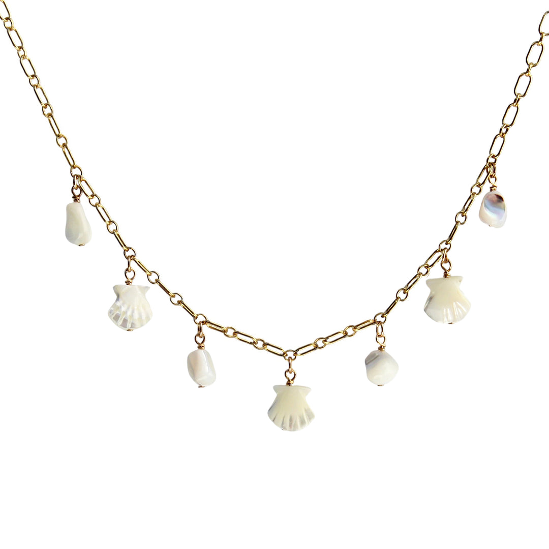 Product photo of a Gold chain necklace featuring mother-of-pearl shells and nugget bead charms, evenly spaced and styled on a white background.