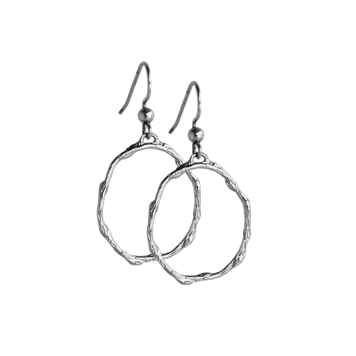 Pair of small silver hoop earrings with a branch-inspired texture, designed in an elongated loop shape