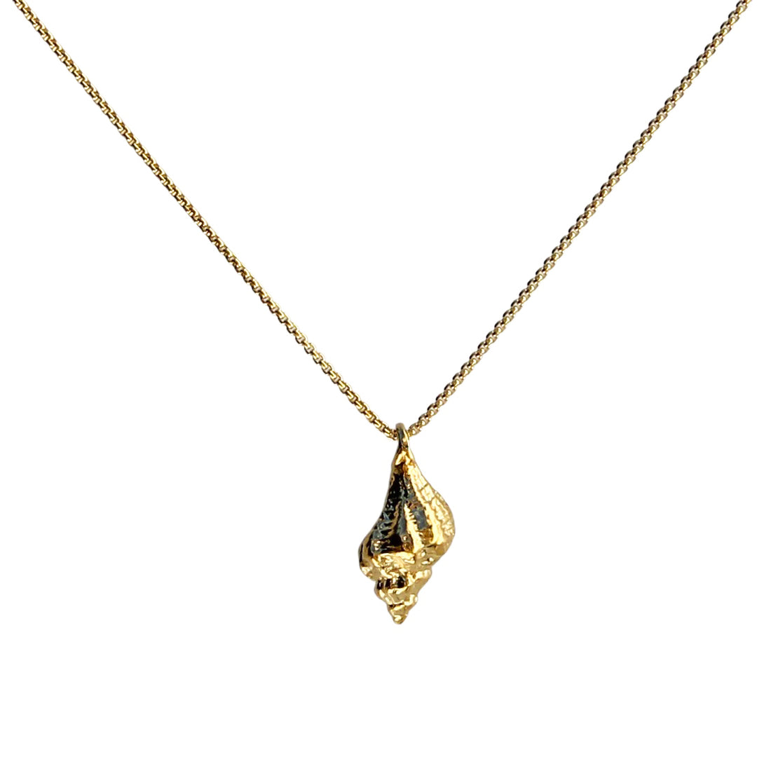 Close-up of the Sea Breeze Necklace featuring a gold chain and a detailed shell-shaped pendant with a polished finish, displayed against a white background.