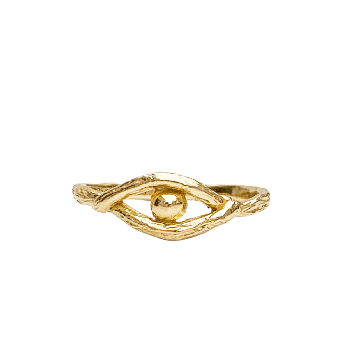 Close-up image of the Eye of Protection Ring in 14k gold, featuring a textured design with an elegant eye shape encasing a polished central sphere. This dainty yet bold ring symbolizes protection, intuition, and guidance, crafted with intricate details for a meaningful statement piece.