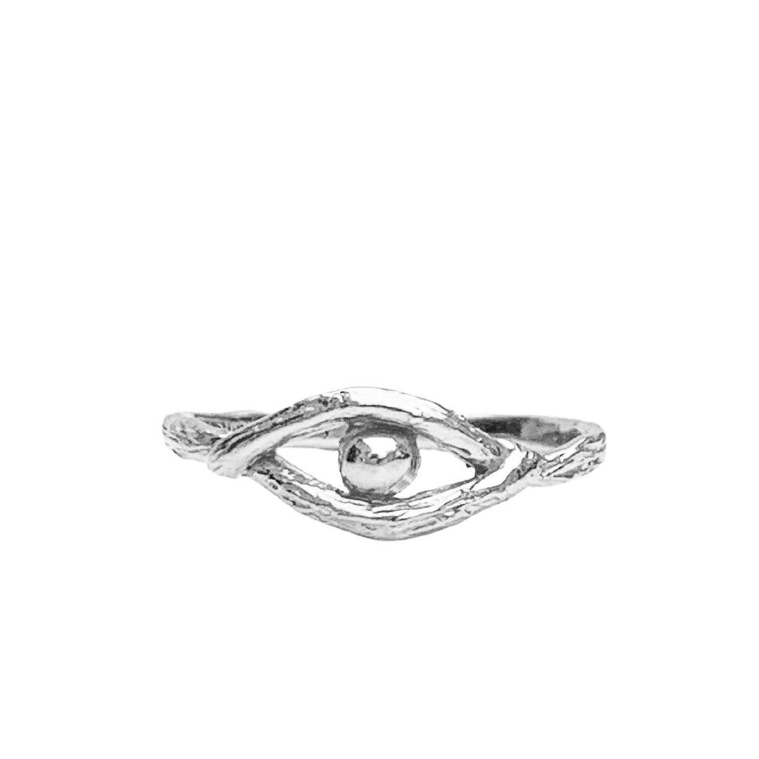 Close-up image of the Eye of Protection Ring in sterling silver, featuring a textured design with an elegant eye shape encasing a polished central sphere. This dainty yet bold ring symbolizes protection, intuition, and guidance, crafted with intricate details for a meaningful statement piece.