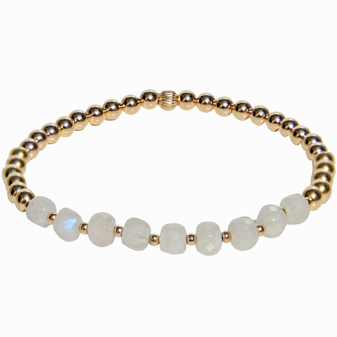 Gold beaded stretch bracelet featuring faceted Moonstone gemstones with a soft glow, symbolizing new beginnings and feminine energy. A delicate and meaningful gemstone bracelet with a minimalist vibe. 