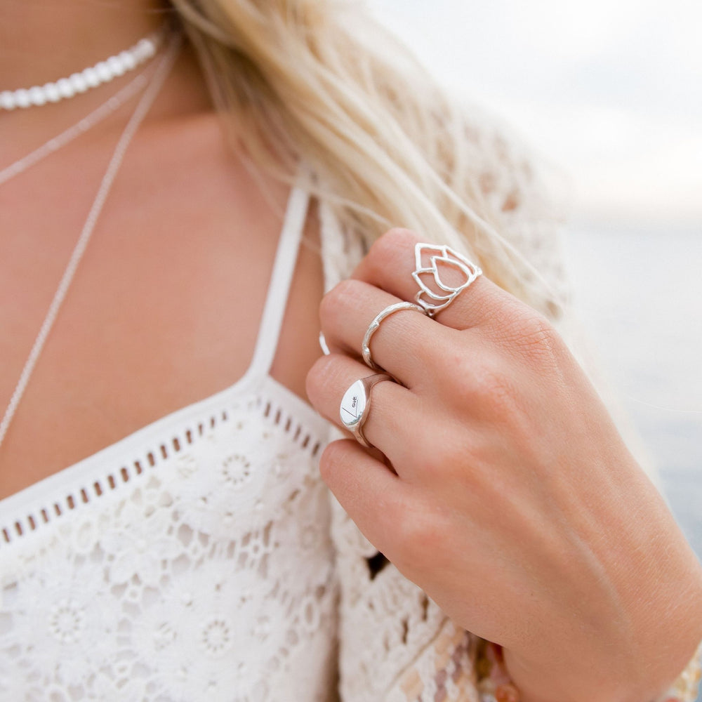 Lotus Ring - Stacking Rings - on model's hand - Blooming Lotus Jewelry