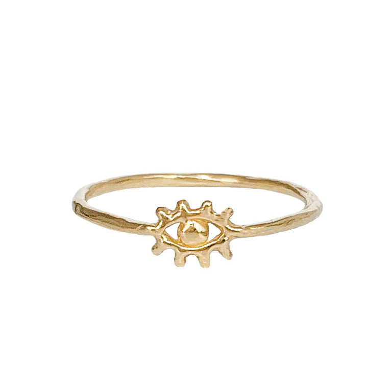 Close-up image of the Tiny Eye of Protection Ring in gold, featuring a delicate eye design with a radiant detail around the center. This dainty ring symbolizes intuition, guidance, and protection, perfect for layering or wearing as a subtle statement piece.